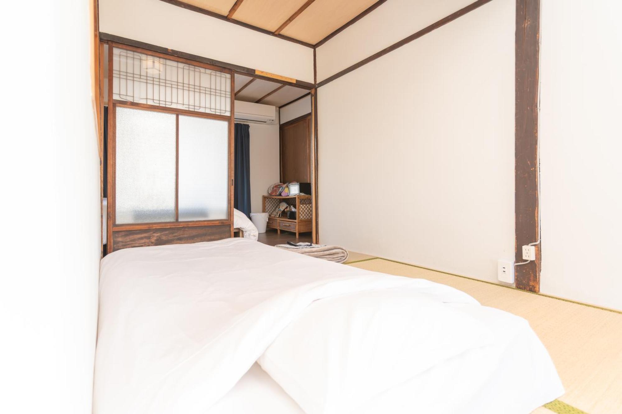 Guesthouse Oneworld Shijo四条京町屋 Kyoto Dış mekan fotoğraf